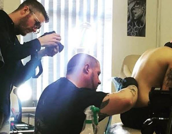Services Ink It tattoos during the iKhokha advertisement shoot